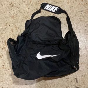 Nike carry sports bag. All zippers work! No cuts or tears.